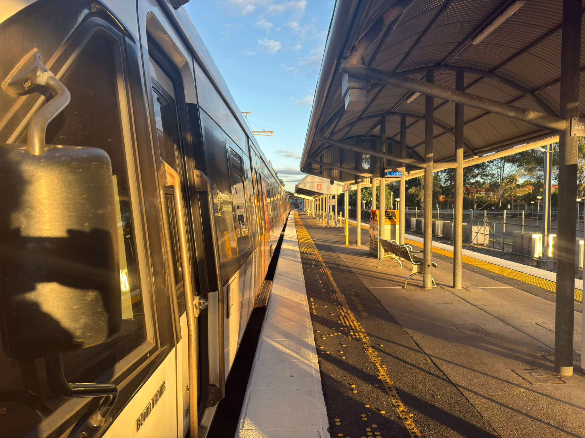 A shot at Cleveland Station depicting a Queensland New Generation Rollingstock train in the sunrise